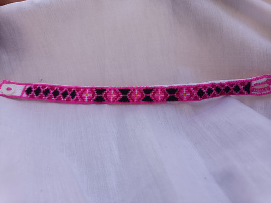 Pulsera en color rosa y negro de Irma 